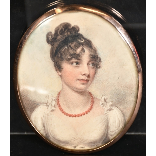 42 - Attributed to William Wood (1768-1809), a miniature portrait of a lady, watercolour and bodycolour o... 