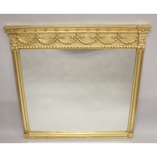 1002 - A GOOD GILTWOOD OVERMANTLE MIRROR. 5ft high x 5ft wide.