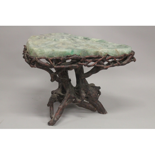 1009 - A SUPERB MARBLE TOP TABLE with rustic  base. 2ft 4ins long, 1ft 10ins wide at the longest point. 1ft... 