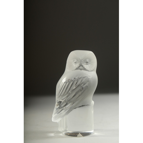 1054 - A LALIQUE GLASS OWL. Etched Lalique France. 3.5ins high.