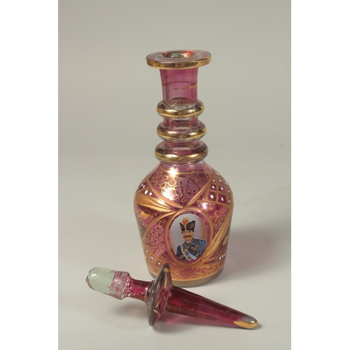 1060 - A GOOD RUSSIAN RUBY GLASS DECANTER AND STOPPER with gilt decoration and and oval portrait of a Russi... 