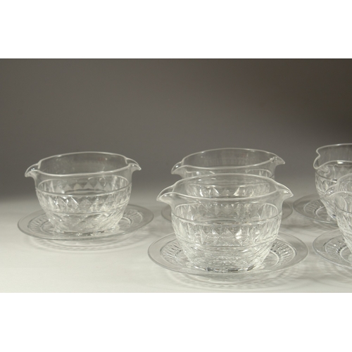 1061 - A GOOD SET OF EIGHT DOUBLE LIP BOWLS AND STANDS.