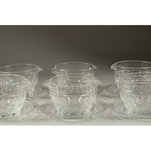 1061 - A GOOD SET OF EIGHT DOUBLE LIP BOWLS AND STANDS.