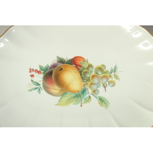 1066 - A LARGE MEISSEN SHELL DISH decorated with fruit, 31cms x 24.5cm and SIX SCALLOPED SHAPE DISHES decor... 