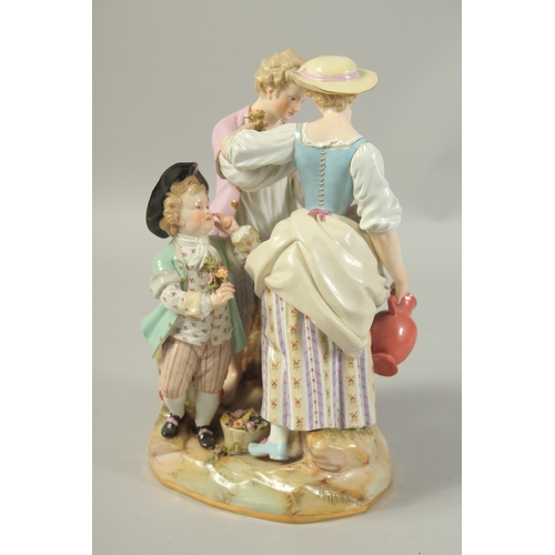 1067 - A LARGE MEISSEN GROUP OF GARDENERS with a child at the back, first modelled by Victor Acier, Cross s... 