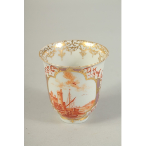 1072 - A GOOD BEAKER AND SAUCER, well painted with iron-red monochromes scenes of figures in a European lan... 