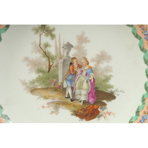 1080 - A MEISSEN OPENWORK PLATE with a scene of lovers, after Watteau. Circa. 1785.  23.5cm diameter. Cross... 