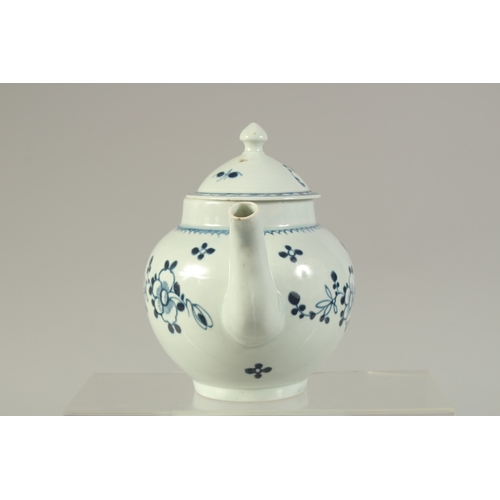 1092 - A LIVERPOOL PORCELAIN GLOBULAR TEAPOT AND COVER, painted with flowers in under glazed blue.