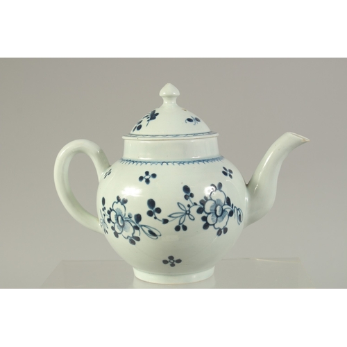 1092 - A LIVERPOOL PORCELAIN GLOBULAR TEAPOT AND COVER, painted with flowers in under glazed blue.