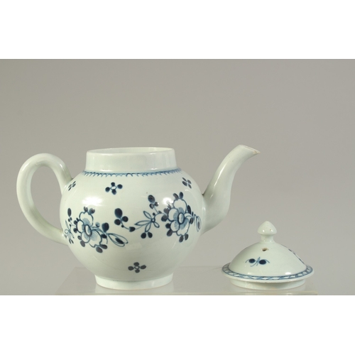 1092 - A LIVERPOOL PORCELAIN GLOBULAR TEAPOT AND COVER, painted with flowers in under glazed blue.