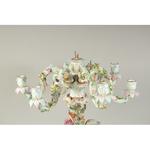 1131 - A SUPERB MEISSEN PORCELAIN CANDELABRA MUDEL VON ERNST, AUGUST LEUTERITZ.1862 -1885. The stem with a ... 