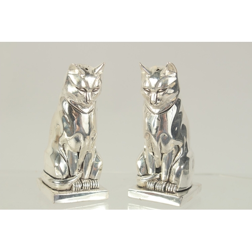 1463 - A PAIR OF SILVER PLATED DECO STYLE CAT SALT AND PEPPERS. 3ins