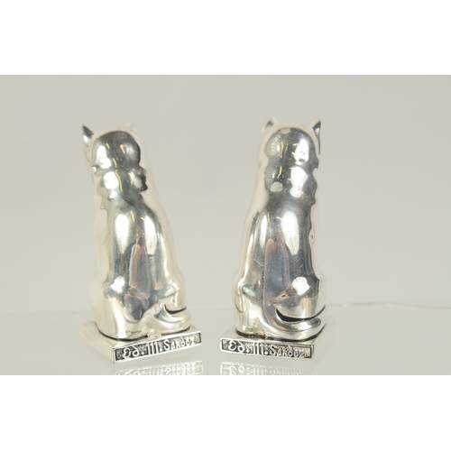 1463 - A PAIR OF SILVER PLATED DECO STYLE CAT SALT AND PEPPERS. 3ins