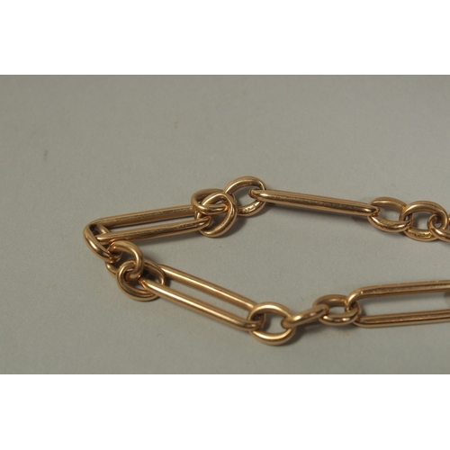 1475 - AN 18CT GOLD CHAIN (WATCH GUARD) 18ins long. Stamped: 18ct.   Maker: W & S.. Weight: 48gms.