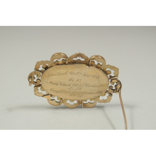 1483 - A VICTORIAN BROOCH inset with hair and seed pearls. Inscribed and dated ,1843.