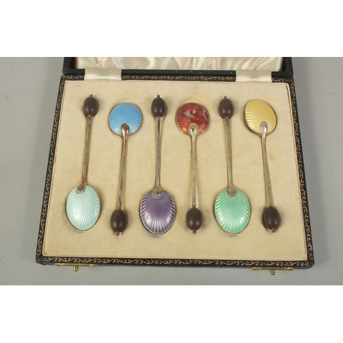 1792 - A SET OF SIX BEAN END COFFEE SPOONS with enamel bowls, cased.