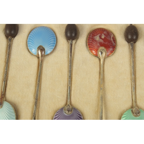 1792 - A SET OF SIX BEAN END COFFEE SPOONS with enamel bowls, cased.