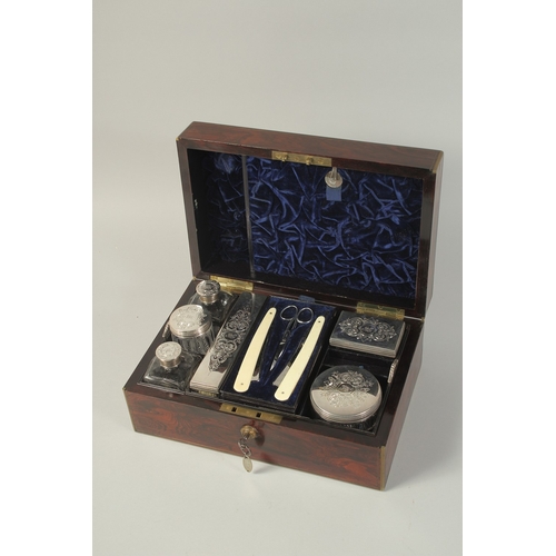 1796 - A VERY GOOD VICTORIAN LADIES ROSEWOOD DRESSING CASE with brass banding opening to reveal five silver... 