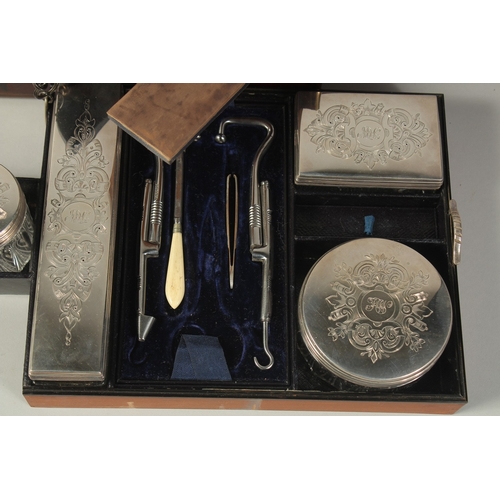 1796 - A VERY GOOD VICTORIAN LADIES ROSEWOOD DRESSING CASE with brass banding opening to reveal five silver... 