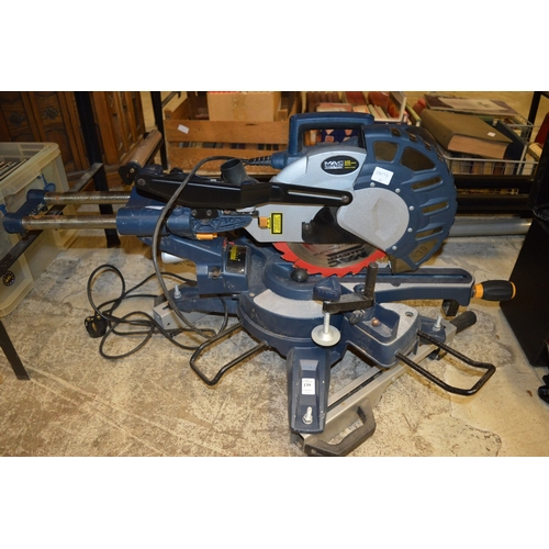 139 - A MacAllister sliding compound miter saw with stand and rail.