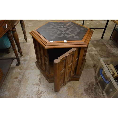 149 - An unusual gothic style hexagonal shaped coffee table/storage box.