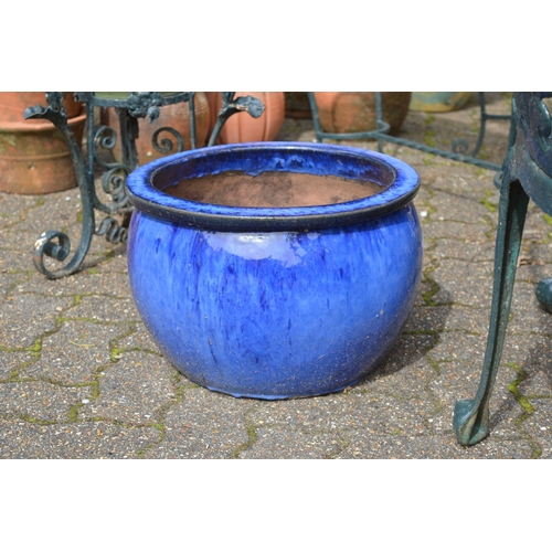 16 - A pair of turquoise glazed planters.