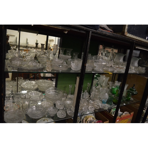 163 - A large quantity of cut and moulded glassware.