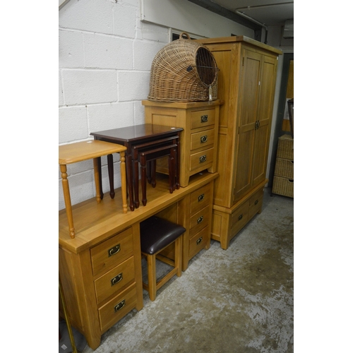 182 - Modern light oak wardrobe together with a matching dressing table, stool and three drawer chest.