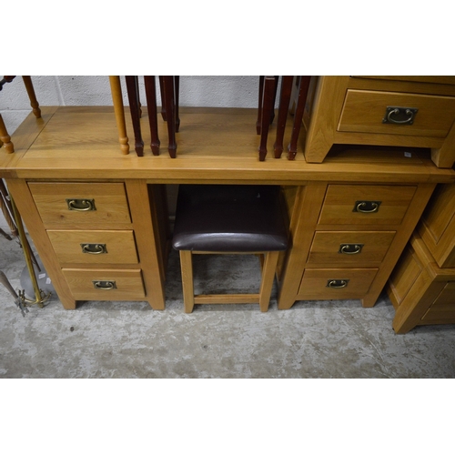 182 - Modern light oak wardrobe together with a matching dressing table, stool and three drawer chest.