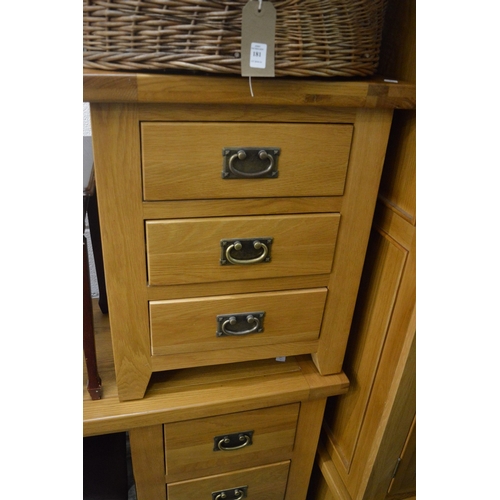 182 - Modern light oak wardrobe together with a matching dressing table, stool and three drawer chest.