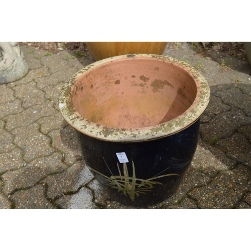 7 - A pair of large glazed planters.