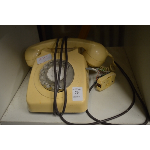 79 - An old telephone.