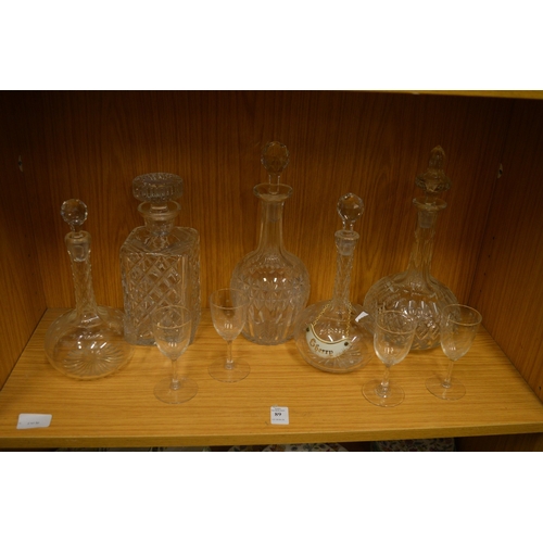 89 - Cut glass decanters etc.