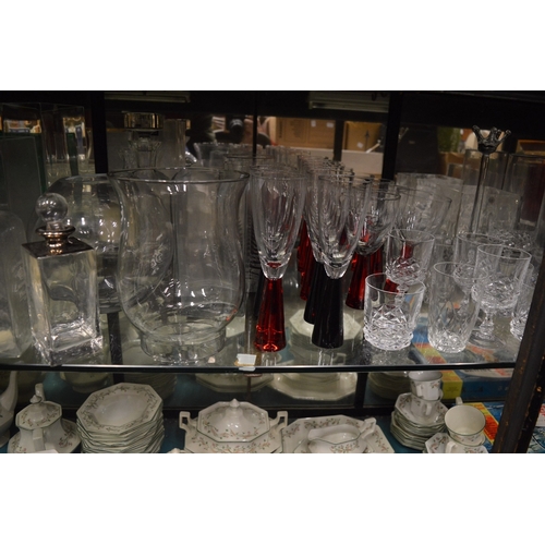 98 - A large quantity of glassware to include numerous vases, drinking glasses etc.