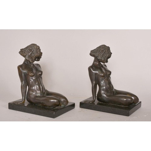 189 - David Mackay-Harrison (b. 1941), Australian, a pair of book ends, of  kneeling female nudes, each on... 