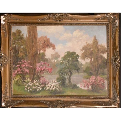 212 - Early 20th Century Continental School, a lake view with trees and bushes in blossom, oil on canvas, ... 