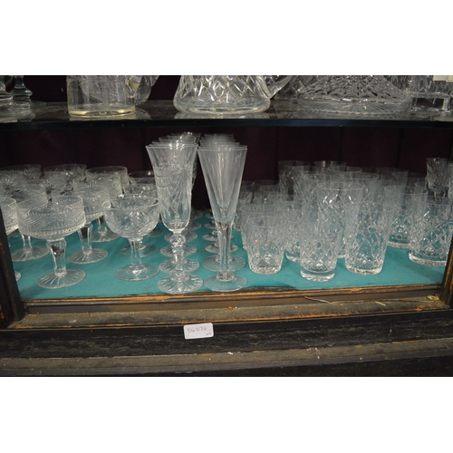 116 - A large quantity of cut glass drinking glasses.