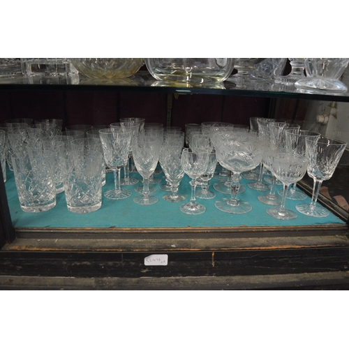 116 - A large quantity of cut glass drinking glasses.