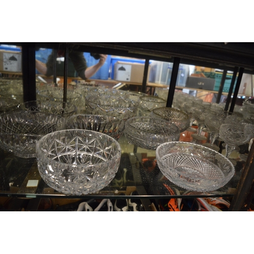 117 - A large quantity of cut glass bowls and other items.