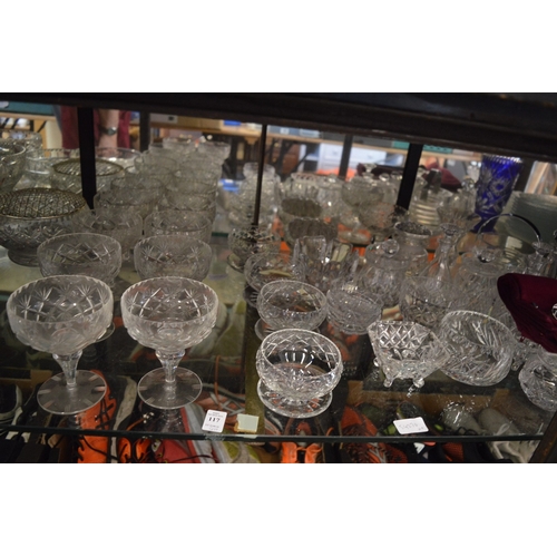 117 - A large quantity of cut glass bowls and other items.