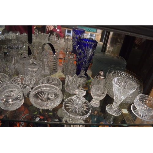 117 - A large quantity of cut glass bowls and other items.