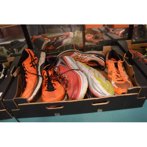 118 - A quantity of old trainers etc.