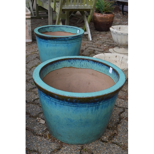 15 - A good large pair of turquoise glazed planters.