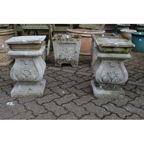 17 - A pair of classical style reconstituted stone pedestals (faults).