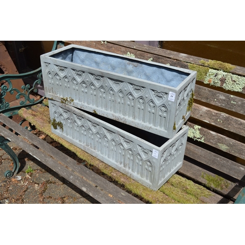 29 - A pair of faux lead rectangular planters.