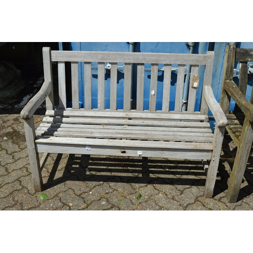 38 - A wooden garden bench.