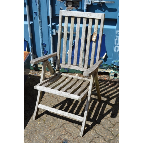 40 - A wooden reclining garden armchair.