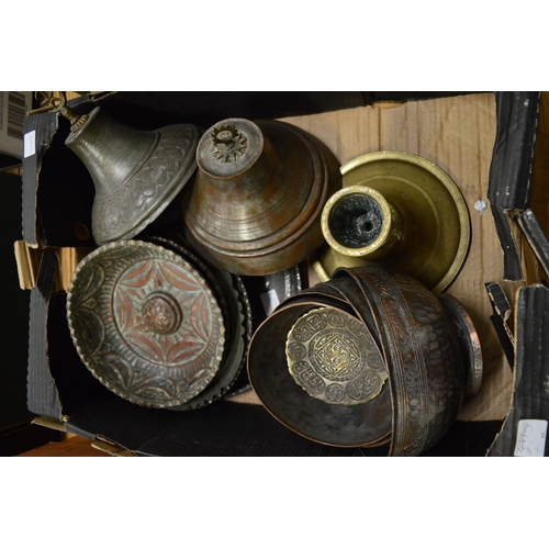 569 - A collection of Eastern metalware.