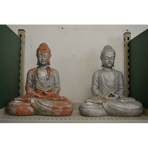 78 - A pair of painted terracotta Buddha's.