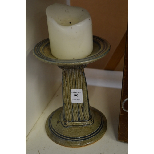 90 - Pottery candlestick.